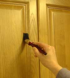 Applying clear Fire Varnish to a door