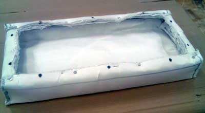 Box formed in heat insulating fabric