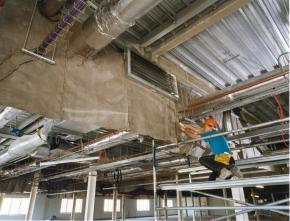 Fire proofing a warehouse roof truss